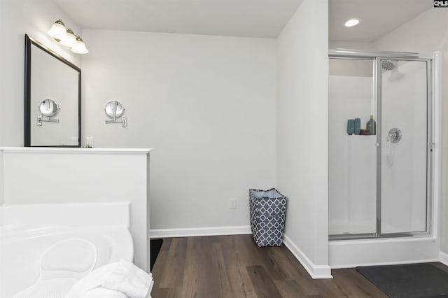 436 N Cobia Ct, Irmo, SC 29063 - bathroom with wood finished floors, a shower stall, baseboards, and recessed lighting