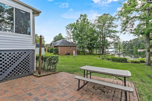 view of patio / terrace featuring a water view