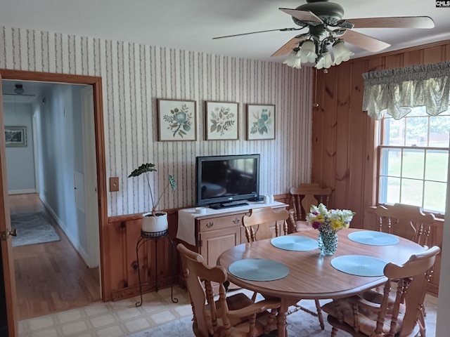 6603 Christie Rd, Columbia, SC 29209 - dining room featuring wallpapered walls, ceiling fan, and light floors