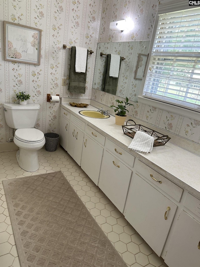 6603 Christie Rd, Columbia, SC 29209 - bathroom with toilet, vanity, and wallpapered walls