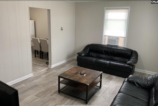 59 Dumont St, Columbia, SC 29201 - living area featuring baseboards, cooling unit, and light wood finished floors