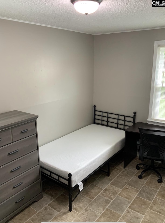 59 Dumont St, Columbia, SC 29201 - bedroom featuring a textured ceiling and ornamental molding