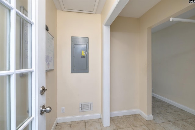 detailed view of electric panel and baseboards