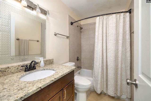 full bathroom featuring toilet, shower / bath combo, and vanity