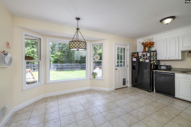 kitchen featuring black appliances, white cabinets, hanging light fixtures, baseboards, and light stone countertops