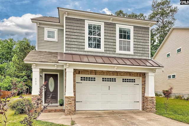 409 Denman Loop, Columbia, SC 29229 - view of front of property with a standing seam roof, an attached garage, driveway, and metal roof