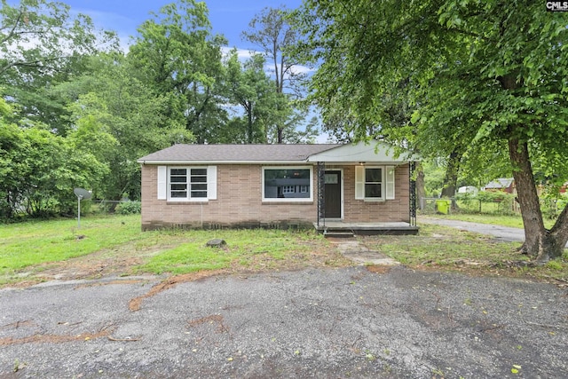 7608 Stone St, Columbia, SC 29209 - view of front of property featuring brick siding and a porch
