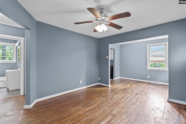 7608 Stone St, Columbia, SC 29209 - unfurnished room with ceiling fan, hardwood / wood-style flooring, and baseboards
