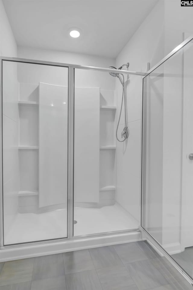 full bathroom with a stall shower