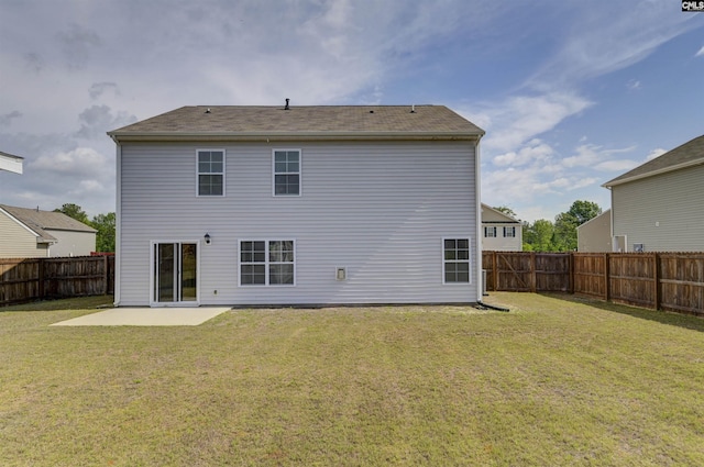 rear view of property featuring a patio