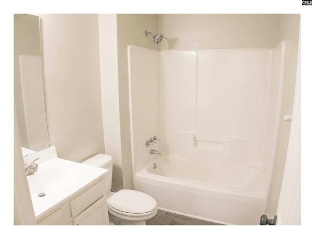 full bathroom featuring toilet, vanity, and shower / tub combination