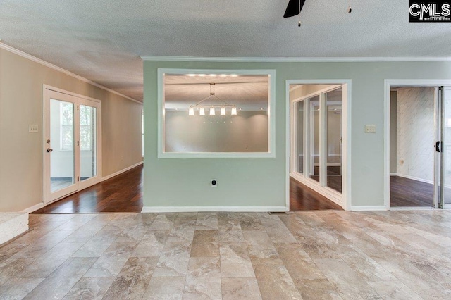 7905 Castleton Ln, Columbia, SC 29223 - empty room with ornamental molding, ceiling fan, a textured ceiling, and baseboards
