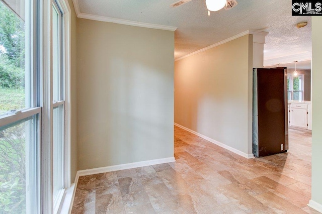 7905 Castleton Ln, Columbia, SC 29223 - spare room with ceiling fan, crown molding, plenty of natural light, baseboards, and a smoke detector