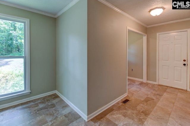 7905 Castleton Ln, Columbia, SC 29223 - foyer with baseboards, crown molding, a textured ceiling, and light stone finish floors