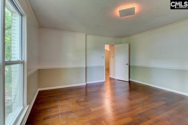 7905 Castleton Ln, Columbia, SC 29223 - unfurnished bedroom featuring wood finished floors, a textured ceiling, ornamental molding, and baseboards