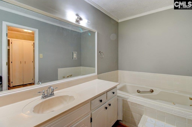 7905 Castleton Ln, Columbia, SC 29223 - bathroom featuring a garden tub, vanity, and ornamental molding