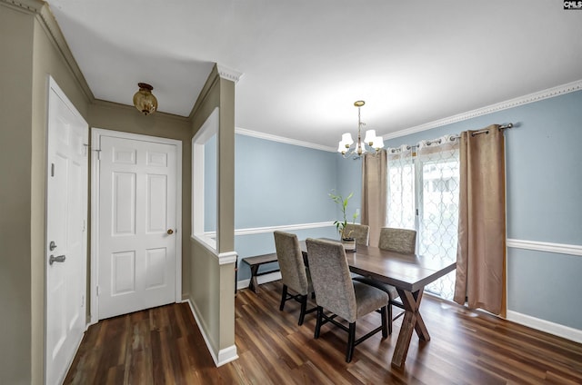dining room featuring dark wood-style flooring, baseboards, a chandelier, and ornamental molding