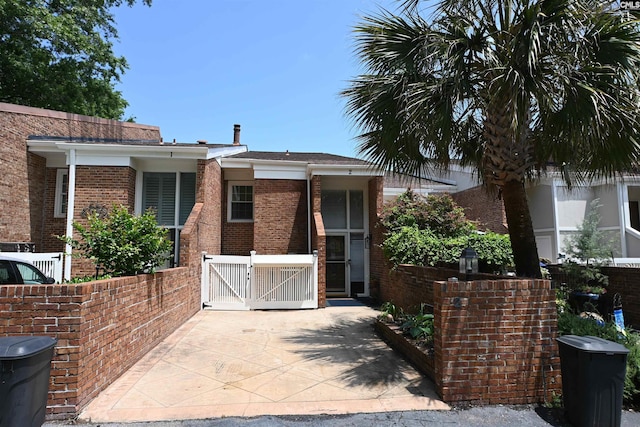 2 Indian Creek Trl, Lexington, SC 29072 - view of front facade featuring a gate and brick siding