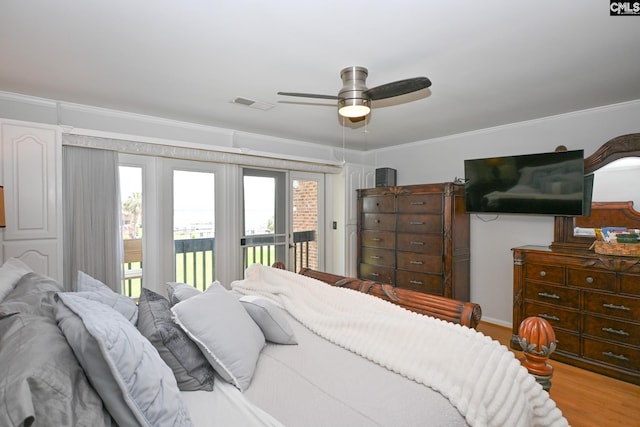 2 Indian Creek Trl, Lexington, SC 29072 - bedroom with access to exterior, multiple windows, wood finished floors, ornamental molding, and ceiling fan