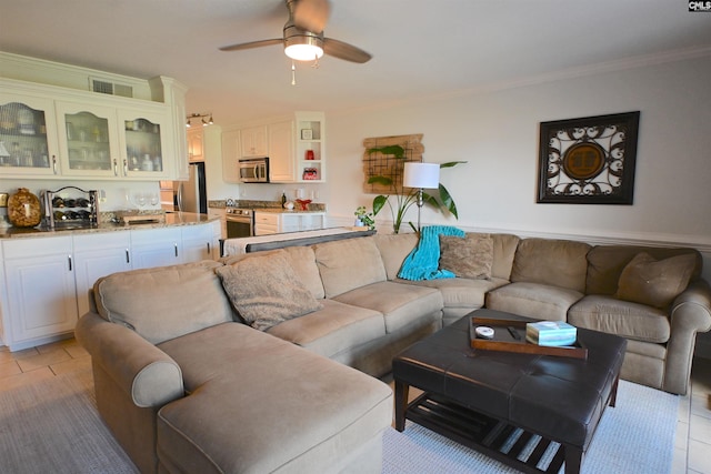 2 Indian Creek Trl, Lexington, SC 29072 - living area featuring crown molding, light tile patterned flooring, and a ceiling fan