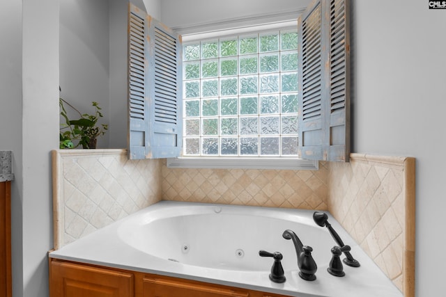 full bathroom with a jetted tub