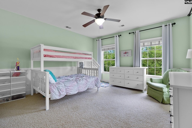 bedroom with carpet floors and a ceiling fan