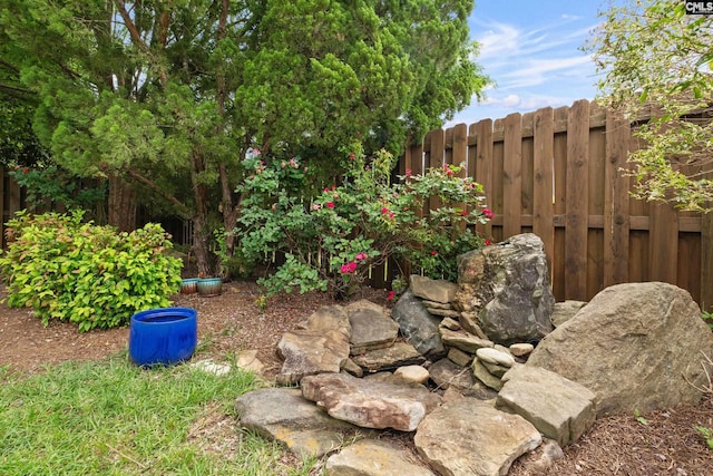 view of yard featuring fence