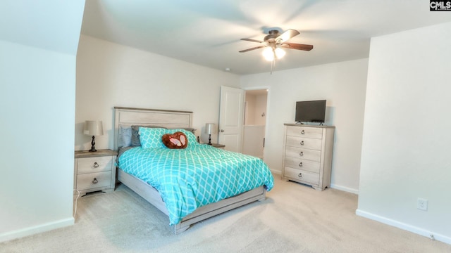 bedroom featuring carpet flooring, baseboards, and a ceiling fan