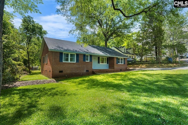 4306 Windemere Ave, Columbia, SC 29203 - view of front of home with crawl space, a front lawn, and brick siding