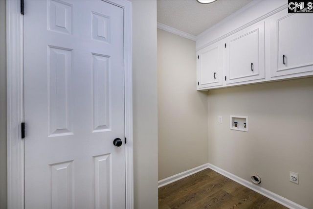 1045 Manchester Cir, Sumter, SC 29154 - laundry room featuring crown molding, hookup for a washing machine, cabinet space, dark wood-type flooring, and baseboards