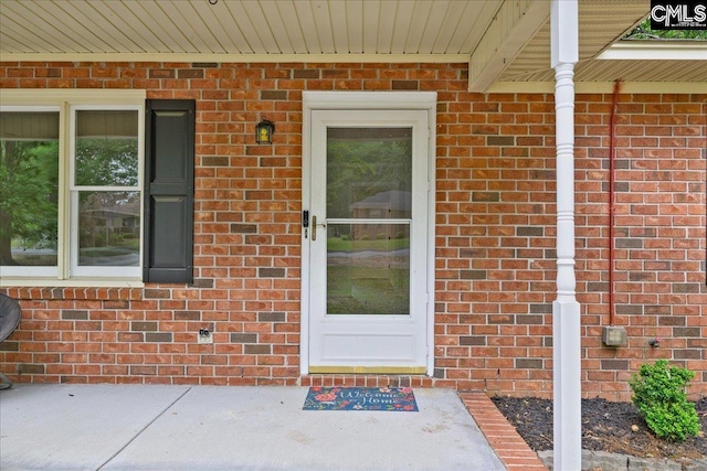 1045 Manchester Cir, Sumter, SC 29154 - doorway to property featuring brick siding