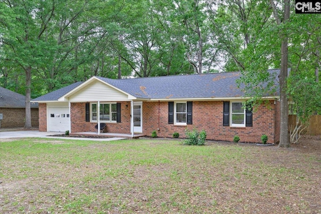 1045 Manchester Cir, Sumter, SC 29154 - single story home featuring an attached garage, brick siding, and driveway