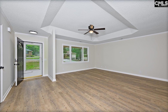 1045 Manchester Cir, Sumter, SC 29154 - foyer entrance with a textured ceiling, wood finished floors, ornamental molding, ceiling fan, and baseboards
