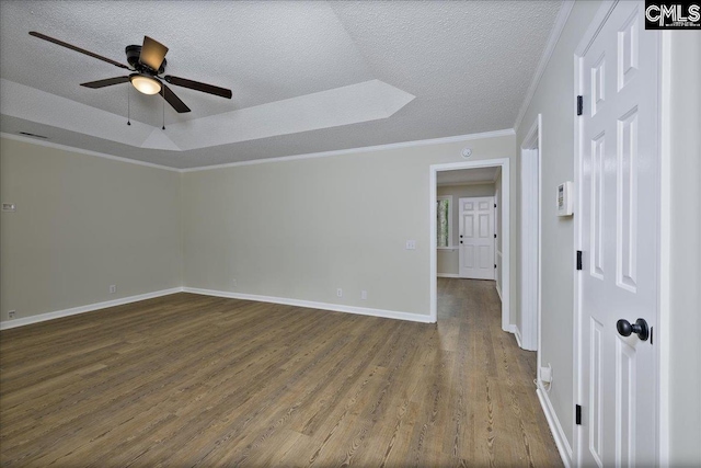 1045 Manchester Cir, Sumter, SC 29154 - spare room with dark wood-style floors, ceiling fan, a textured ceiling, ornamental molding, and baseboards