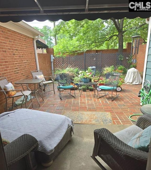 124 Carlyle Cir, Columbia, SC 29206 - fenced backyard with a patio