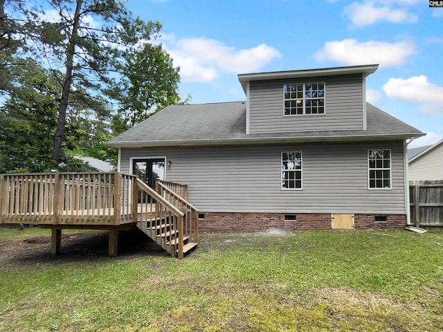 rear view of house featuring crawl space, a wooden deck, and a shingled roof