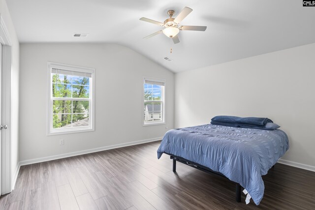 2794 Prince Charles Ct, Columbia, SC 29209 - bedroom with multiple windows, vaulted ceiling, wood finished floors, and a ceiling fan