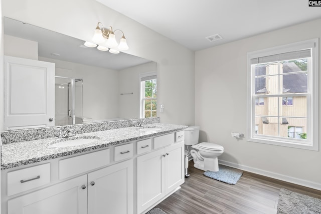 2794 Prince Charles Ct, Columbia, SC 29209 - full bathroom with toilet, baseboards, a shower stall, double vanity, and wood finished floors