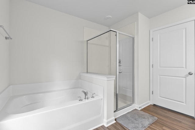 2794 Prince Charles Ct, Columbia, SC 29209 - bathroom with wood finished floors, a shower stall, a bath, and baseboards