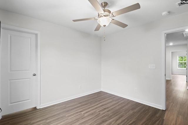 2794 Prince Charles Ct, Columbia, SC 29209 - unfurnished room featuring dark wood-style floors, a smoke detector, baseboards, and ceiling fan