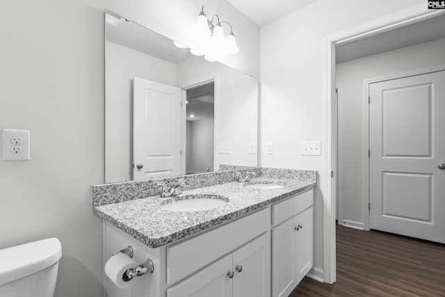 2794 Prince Charles Ct, Columbia, SC 29209 - bathroom with toilet, wood finished floors, double vanity, and baseboards