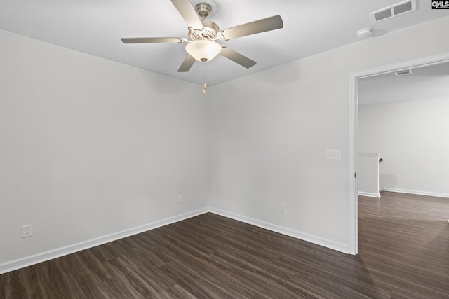 2794 Prince Charles Ct, Columbia, SC 29209 - unfurnished room with dark wood-style floors, baseboards, a ceiling fan, and a smoke detector