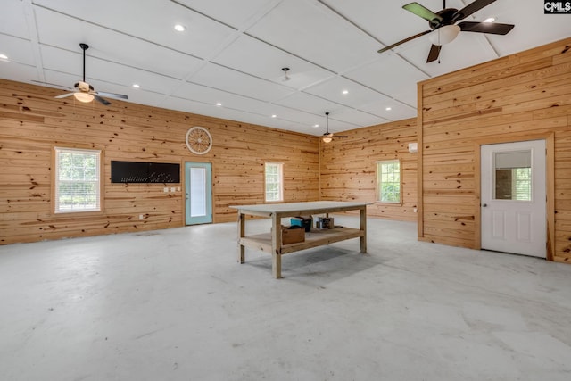 1307 Dusty Rd, Cope, SC 29038 - rec room featuring a ceiling fan, concrete flooring, wooden walls, plenty of natural light, and recessed lighting