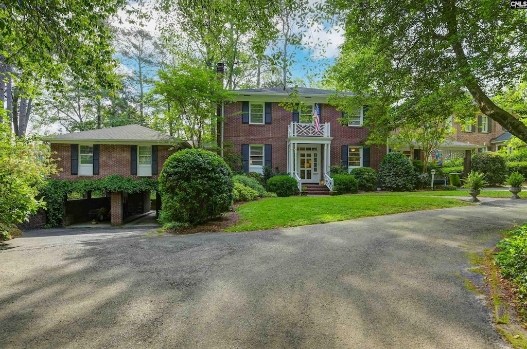 712 Spring Lake Rd, Columbia, SC 29206 - view of front facade featuring brick siding and a front yard