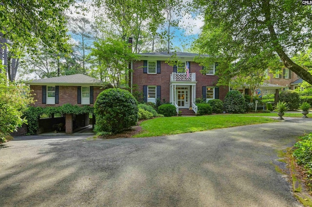 712 Spring Lake Rd, Columbia, SC 29206 - view of front facade featuring brick siding and a front yard