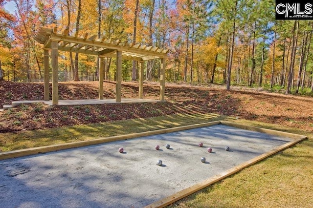 view of yard featuring a bocce ball area