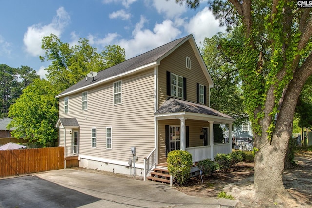 1029 Maxcy St, Columbia, SC 29201 - view of front of house with a porch, roof with shingles, and fence