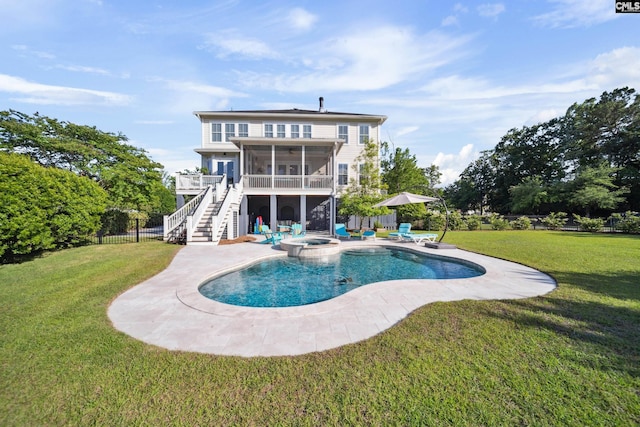 3011 River Vista Way, Mount Pleasant, SC 29466 - back of property with a sunroom, stairs, a patio, and a pool with connected hot tub