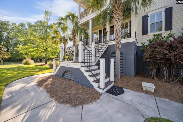 3011 River Vista Way, Mount Pleasant, SC 29466 - property entrance featuring a lawn and covered porch