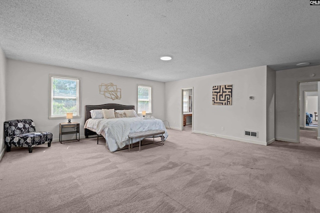 3040 Barnes Springs Rd, Columbia, SC 29204 - bedroom featuring a textured ceiling, carpet floors, and baseboards